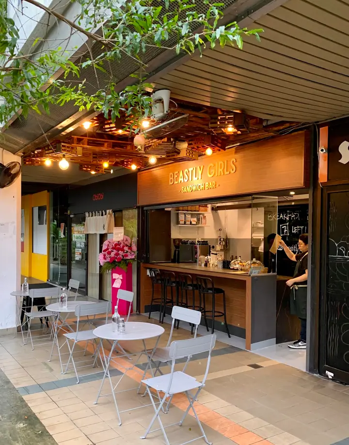 Dog enjoying time at Beastly Girls Sandwich Bar in Singapore.