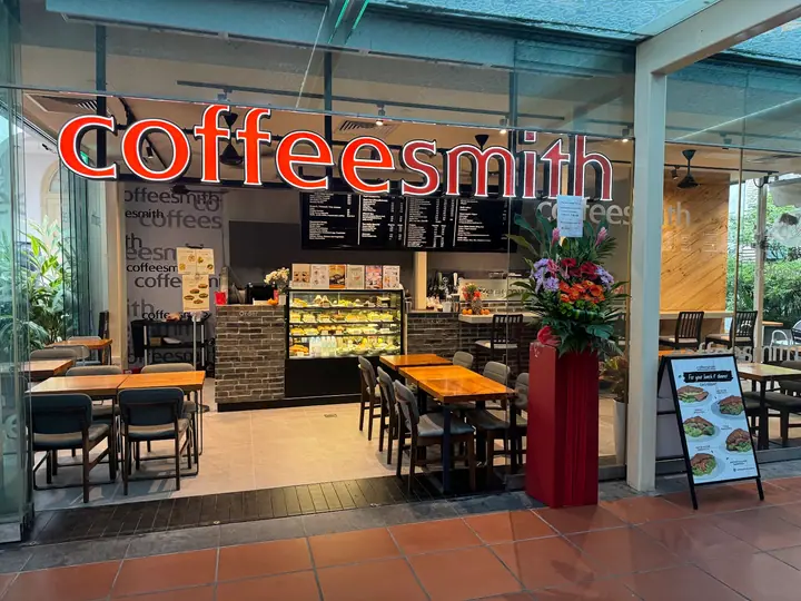 A dog at Coffeesmith in Singapore.