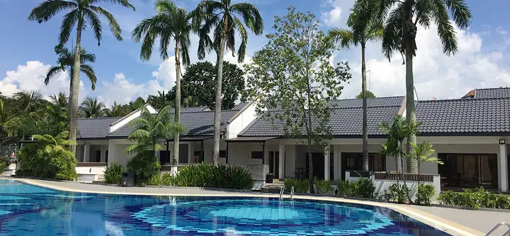 Dog enjoying time at Civil Service Club @ Loyang (Former Aloha Loyang) in Singapore.