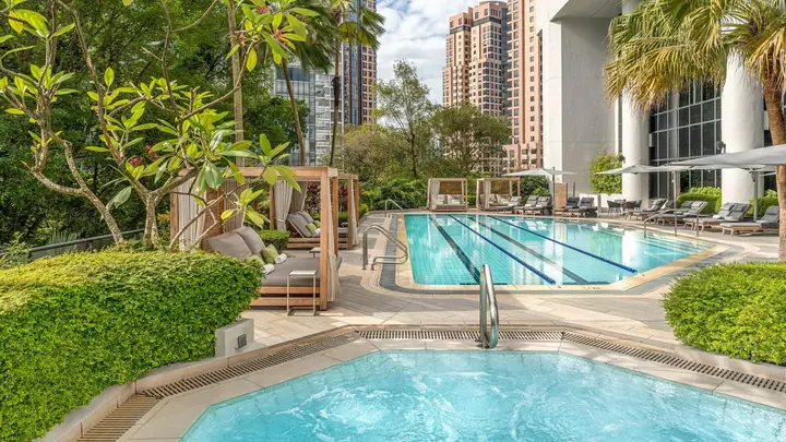 Dog enjoying time at Four Seasons Hotel Singapore in Singapore.