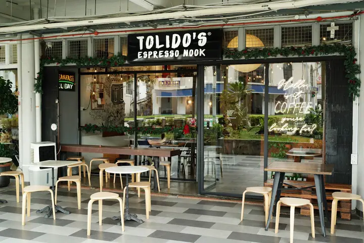 A dog at Tolido's Espresso Nook in Singapore.