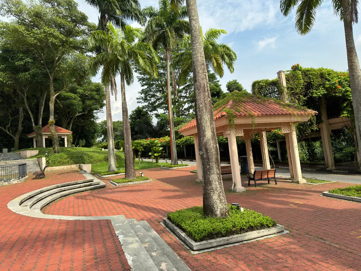 Palm trees, red-brick terraces and sheltered pavilions at Mount Faber Park.